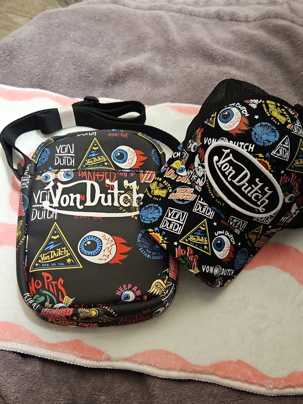 Von Dutch Black Crossbody Bag with Colorful Graphic Accents 2 Piece Bag And Hat